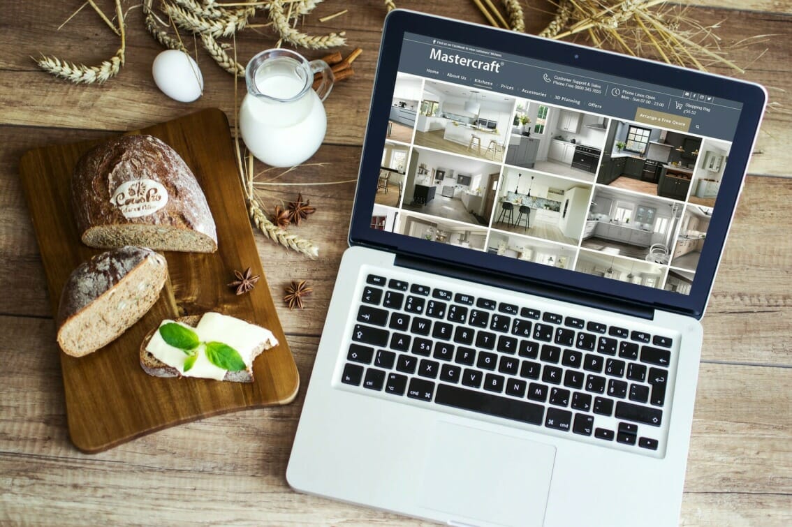 lap top on table with mastercraft kitchens site lap top on table with mastercraft kitchens site